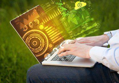 Modern notebook computer with future technology media symbols